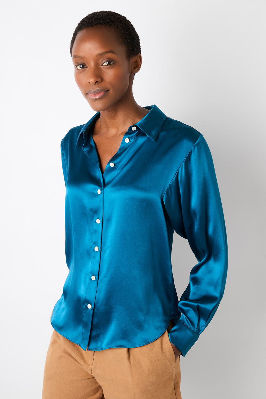 https://www.wyselondon.com/cdn/shop/products/celeste-teal-silk-shirt_3.jpg?v=1677510569&width=900